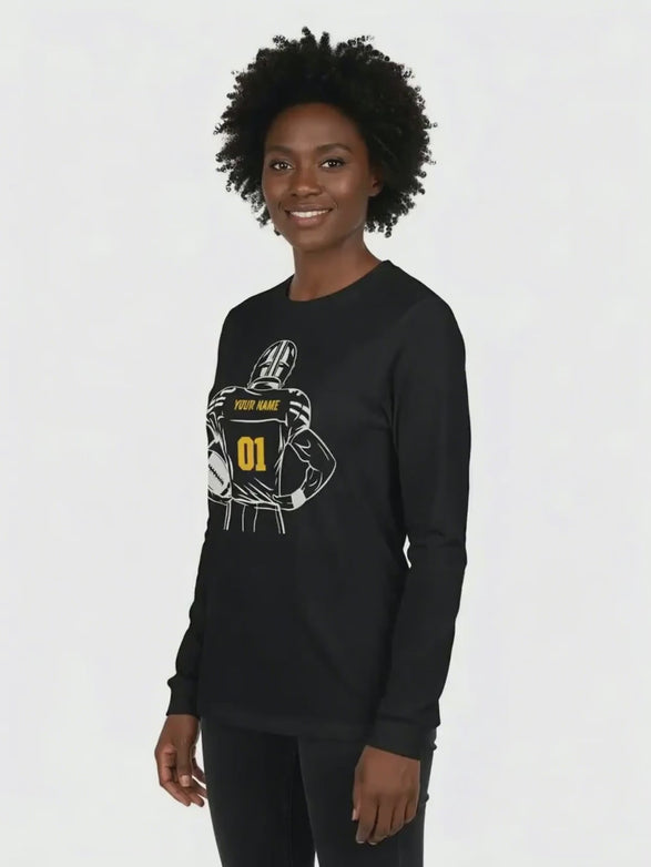 Woman wearing a customizable football long sleeve t-shirt against a white background